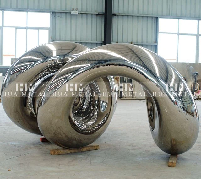 mirror stainless steel monumental Unwind sculpture by Richard Hudson